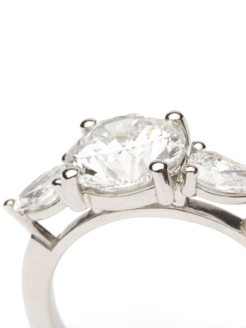 Trotters Platinum 3 Stone Lab Grown Diamond Ring Brilliant Round And Pear Shoulders
