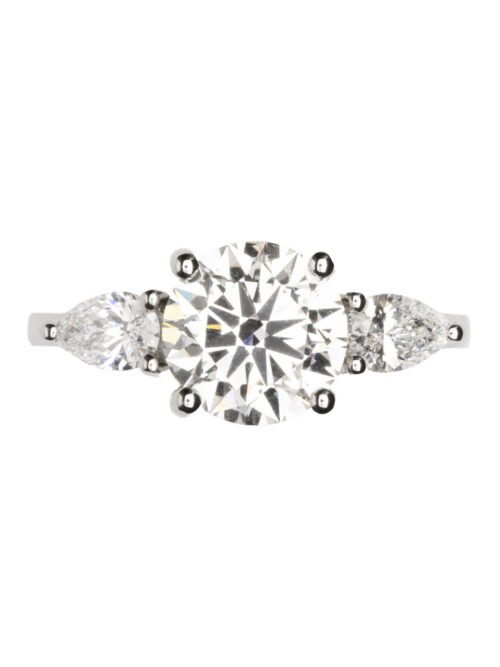 Trotters Platinum 3 Stone Lab Grown Diamond Ring Brilliant Round And Pear Shoulders