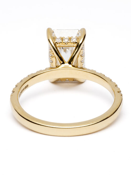 Trotters 18ct Yellow Gold 3.05ct Lab Grown Emerald Cut Diamond Ring With Diamond Set Shoulders