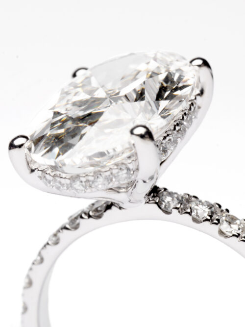 Trotters Platinum 5ct Lab Grown Oval Diamond Ring With Diamond Set Shoulders & Hidden Diamond Halo