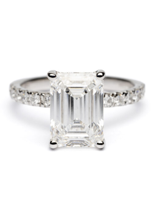 Trotters Platinum 3ct Lab Grown Emerald Cut Diamond Ring With Diamond Set Shoulders & Hidden Halo