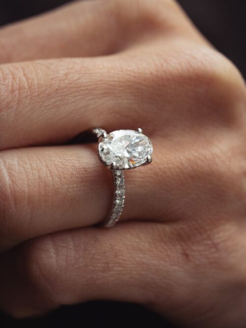 Trotters Platinum 2.5ct Lab Grown Oval Diamond Ring With Diamond Set Shoulders & Hidden Diamond Halo