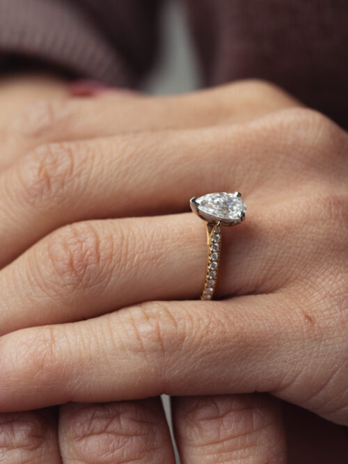 Trotters 18ct Yellow Gold / Platinum Pear Shape Lab Grown  Diamond Ring With Diamond Set Shoulders 0.18ct