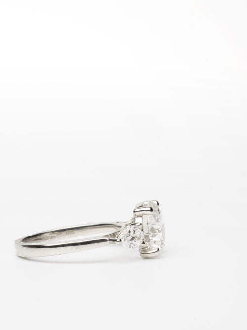 Trotters Platinum 3 Stone Lab Grown Diamond Ring Brilliant Round And Pear Shoulders