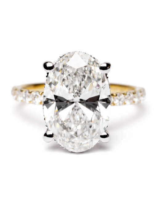 Trotters 18ct Yellow Gold & Platinum 4ct Lab Grown Oval Diamond Ring With Diamond Set Shoulders & Hidden Diamond Halo
