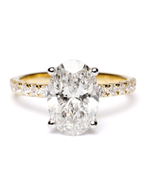 Trotters 18ct Yellow Gold & Platinum 3ct Lab Grown Oval Diamond Ring With Diamond Set Shoulders & Hidden Diamond Halo