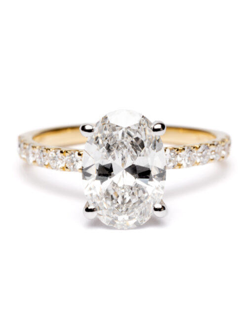 Trotters 18ct Yellow Gold & Platinum 2ct Lab Grown Oval Diamond Ring With Diamond Set Shoulders & Hidden Diamond Halo
