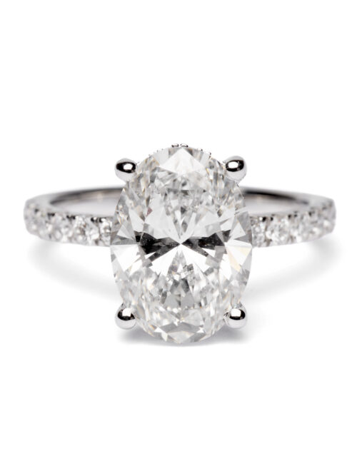 Trotters Platinum 3ct Lab Grown Oval Diamond Ring With Diamond Set Shoulders & Hidden Diamond Halo