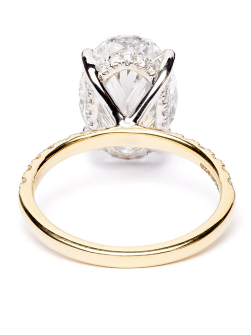 Trotters 18ct Yellow Gold & Platinum 5ct Lab Grown Oval Diamond Ring With Diamond Set Shoulders & Hidden Diamond Halo