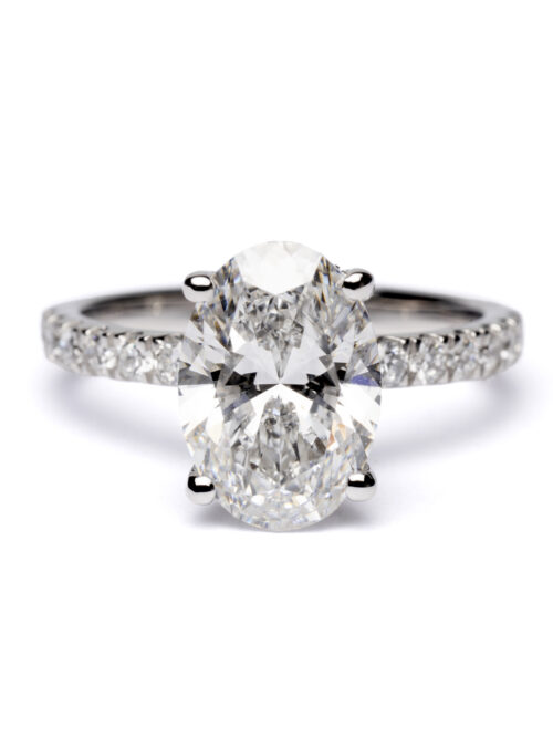 Trotters Platinum 2.5ct Lab Grown Oval Diamond Ring With Diamond Set Shoulders & Hidden Diamond Halo