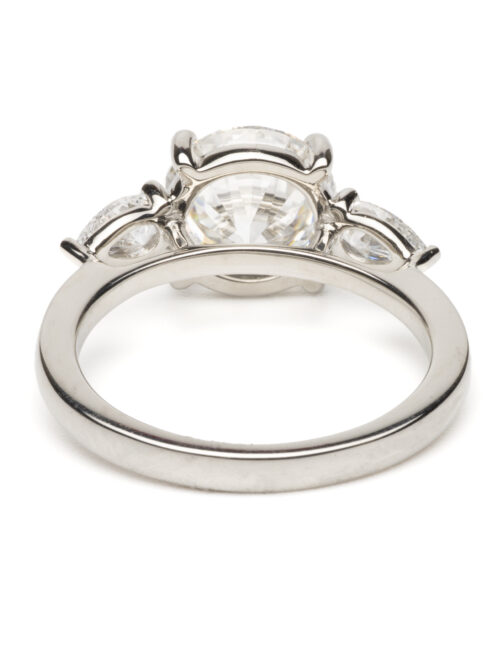 Trotters Platinum 3 Stone Lab Grown Diamond Ring Brilliant Round And Pear Shoulders