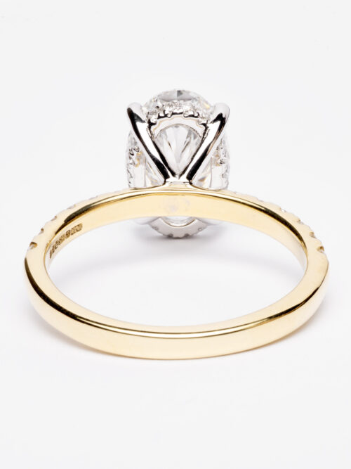 Trotters 18ct Yellow Gold & Platinum 2.5ct Lab Grown Oval Diamond Ring With Diamond Set Shoulders & Hidden Diamond Halo
