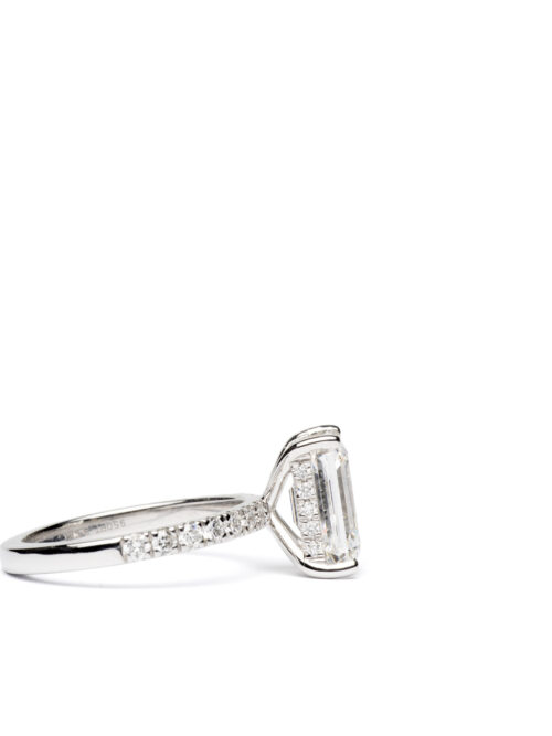 Trotters Platinum 3ct Lab Grown Emerald Cut Diamond Ring With Diamond Set Shoulders & Hidden Halo