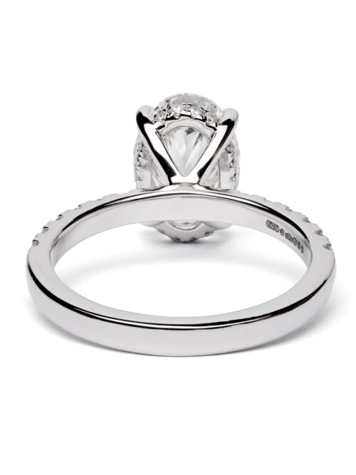 Trotters Platinum 2.5ct Lab Grown Oval Diamond Ring With Diamond Set Shoulders & Hidden Diamond Halo