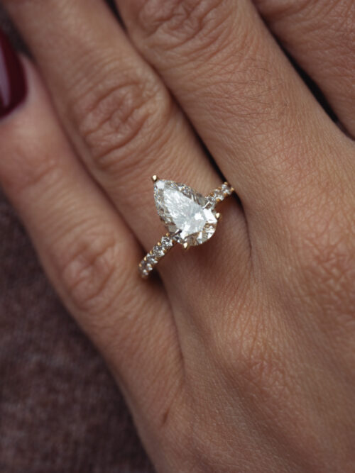 Trotters 18ct Yellow Gold 2ct Lab Grown Pear Shape Diamond Ring With Diamond Set Shoulders & Hidden Diamond Halo