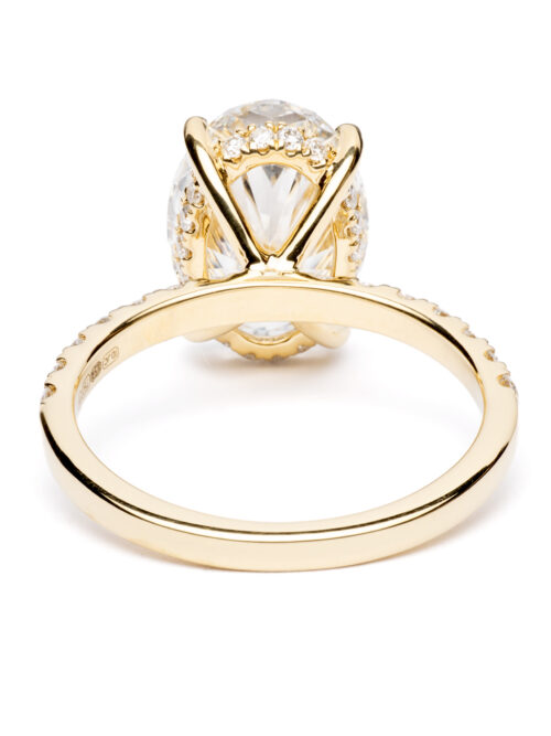 Trotters 18ct Yellow Gold 4ct Lab Grown Oval Diamond Ring With Diamond Set Shoulders & Hidden Diamond Halo