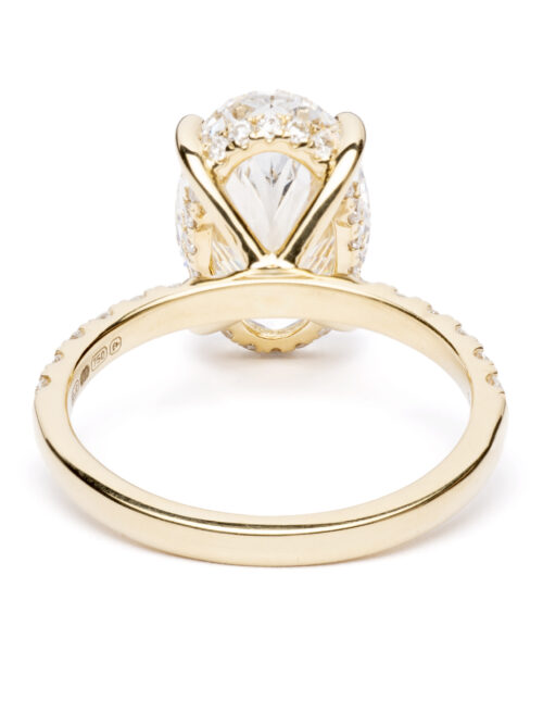 Trotters 18ct Yellow Gold 4ct Lab Grown Oval Diamond Ring With Diamond Set Shoulders & Hidden Diamond Halo