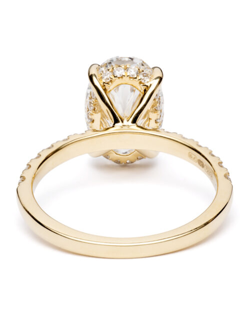 Trotters 18ct Yellow Gold 3ct Lab Grown Oval Diamond Ring With Diamond Set Shoulders And Hidden Diamond Halo