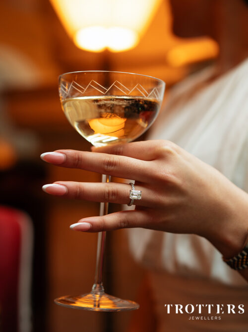 Trotters Platinum 3ct Lab Grown Emerald Cut Diamond Ring With Diamond Set Shoulders & Hidden Halo