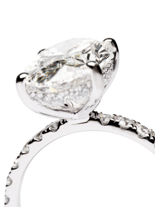 Trotters Platinum 4ct Lab Grown Oval Diamond Ring With Diamond Set Shoulders And Hidden Halo