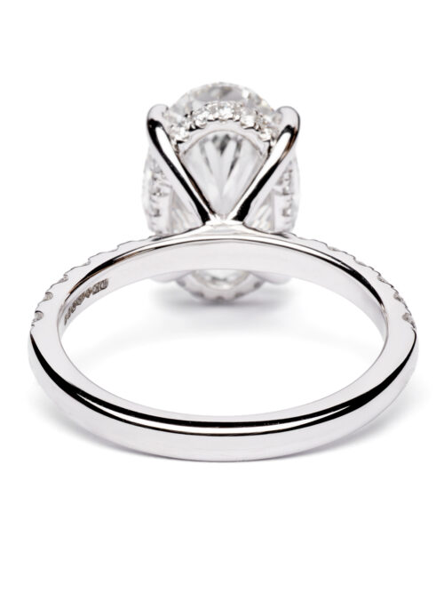 Trotters Platinum 4ct Lab Grown Oval Diamond Ring With Diamond Set Shoulders And Hidden Halo