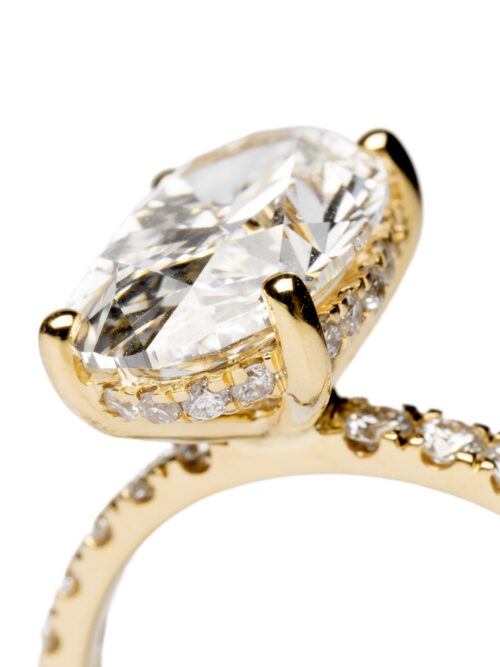 Trotters 18ct Yellow Gold 3ct Lab Grown Oval Diamond Ring With Diamond Set Shoulders And Hidden Diamond Halo