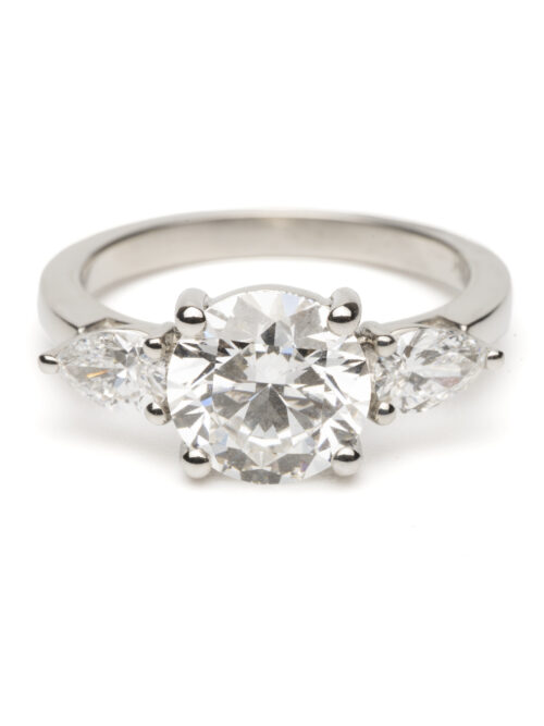 Trotters Platinum 3 Stone Lab Grown Diamond Ring Brilliant Round And Pear Shoulders