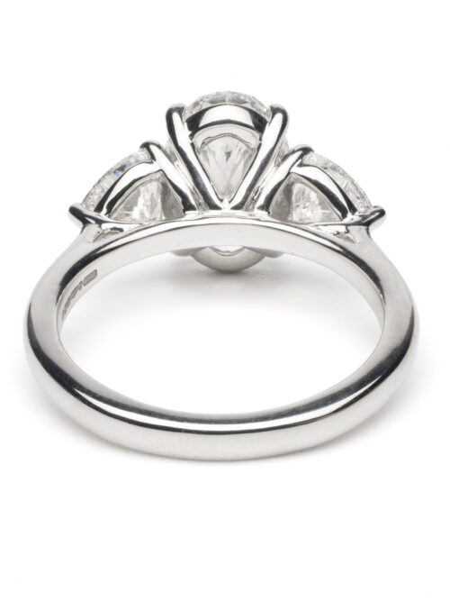 Trotters Platinum Three Stone Lab Grown Diamond Ring With Oval Centre 2.50ct And Heart Shoulders