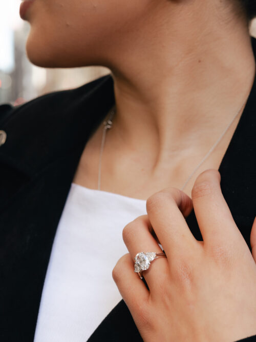 Trotters Platinum Three Stone Lab Grown Diamond Ring With Oval Centre 2.50ct And Heart Shoulders