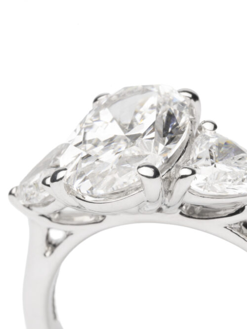 Trotters Platinum Three Stone Lab Grown Diamond Ring With Oval Centre 2.50ct And Heart Shoulders