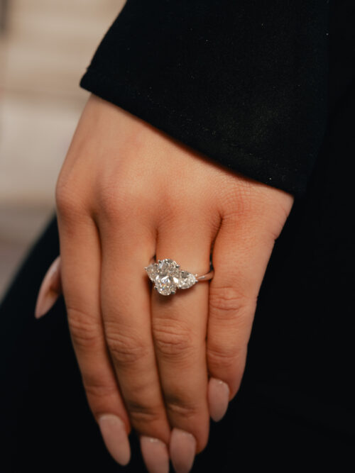 Trotters Platinum Three Stone Lab Grown Diamond Ring With Oval Centre 2.50ct And Heart Shoulders