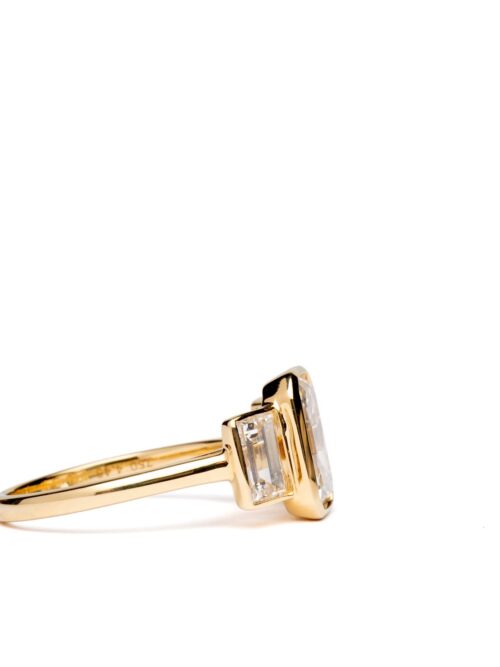 Trotters 18ct Yellow Gold 3ct Emerald Cut Lab Grown Diamond Ring With Baguette Shoulders Bezel / Rubover Set