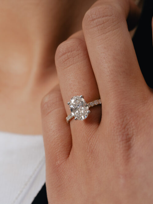 Trotters 18ct Yellow Gold & Platinum 2ct Lab Grown Oval Diamond Ring With Diamond Set Shoulders & Hidden Diamond Halo