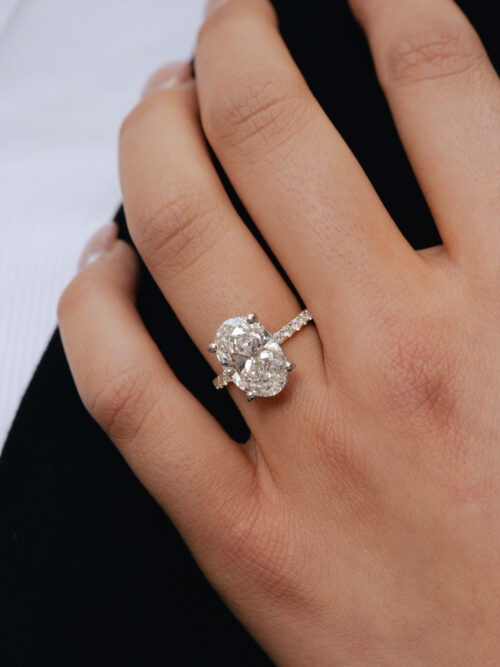 Trotters 18ct Yellow Gold & Platinum 4ct Lab Grown Oval Diamond Ring With Diamond Set Shoulders & Hidden Diamond Halo