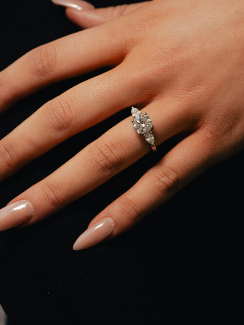 Trotters Platinum 3 Stone Lab Grown Diamond Ring Brilliant Round And Pear Shoulders