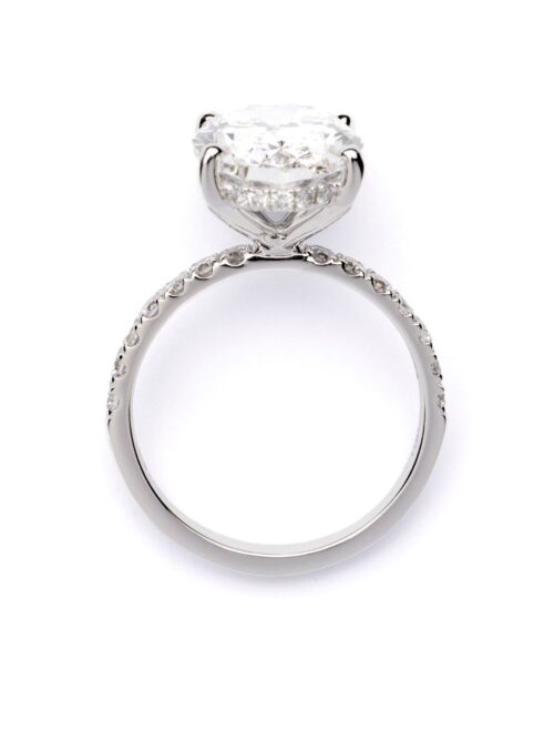 Trotters Platinum 5ct Oval Cut Lab Grown Diamond Ring With Diamond Set Shoulders And Hidden Diamond Halo