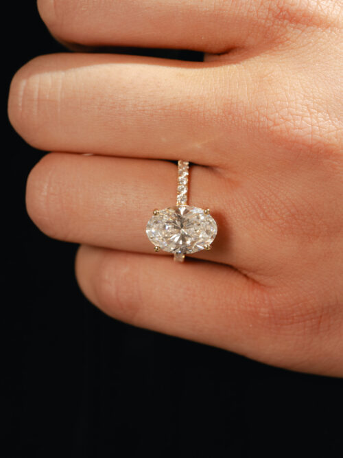 Trotters 18ct Yellow Gold 4ct Lab Grown Oval Diamond Ring With Diamond Set Shoulders & Hidden Diamond Halo