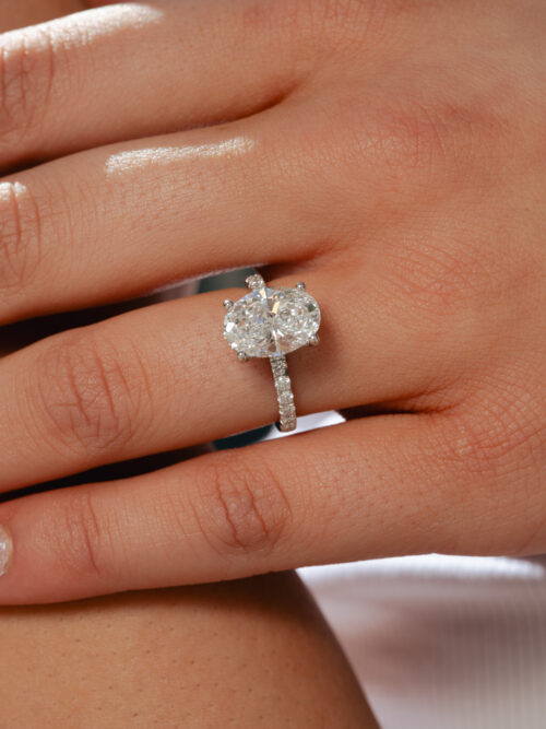 Trotters Platinum 3ct Lab Grown Oval Diamond Ring With Diamond Set Shoulders & Hidden Diamond Halo