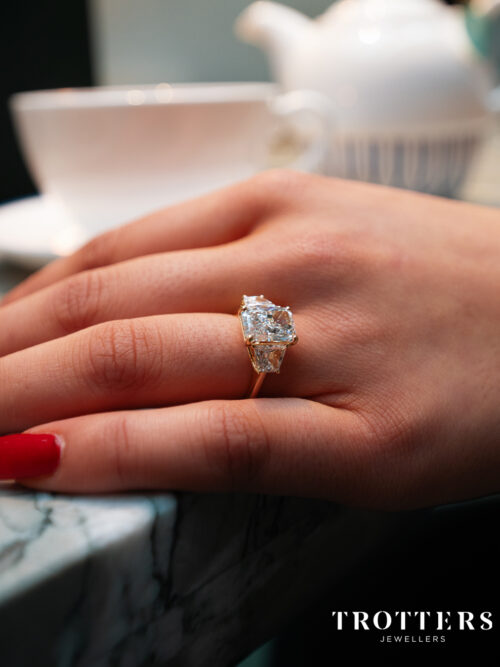Trotters 18ct Yellow Gold 3ct Radiant Cut Lab Grown Diamond Ring With Trapezoid Shoulders