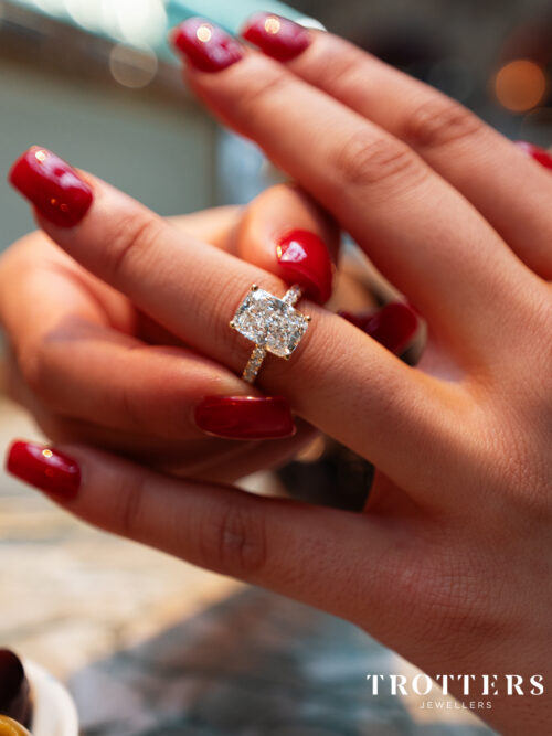 Trotters 18ct Yellow Gold 3ct Cushion Cut Lab Grown Diamond Ring With Diamond Set Shoulders And Hidden Diamond Halo