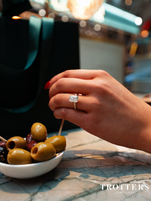 Trotters 18ct Yellow Gold 3ct Cushion Cut Lab Grown Diamond Ring With Diamond Set Shoulders And Hidden Diamond Halo