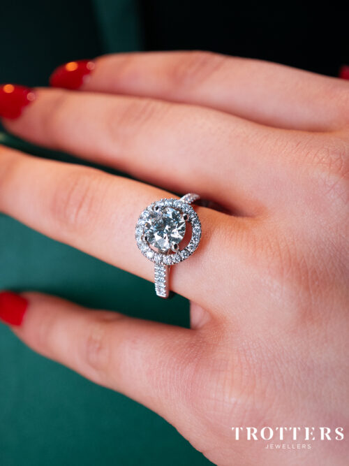 Trotters Platinum Single Stone Lab Grown Diamond Ring Brilliant Round With A Diamond Halo And Shoulders