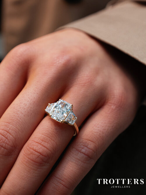 Trotters 18ct Yellow Gold 3ct Radiant Cut Lab Grown Diamond Ring With Trapezoid Shoulders