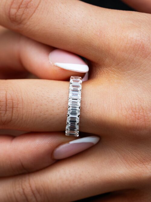 Trotters 9ct White Gold 2.43ct Emerald Cut And 1.47ct Oval Cut Lab Grown Diamond Eternity Ring
