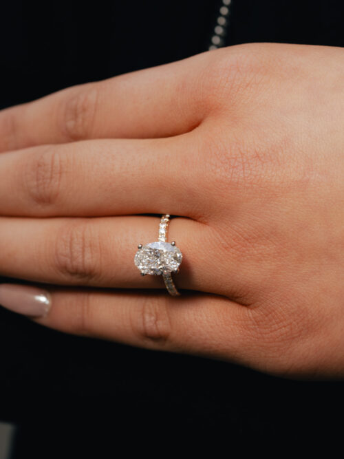 Trotters 18ct Yellow Gold & Platinum 2.6ct Lab Grown Oval Diamond Ring With Diamond Set Shoulders & Hidden Diamond Halo