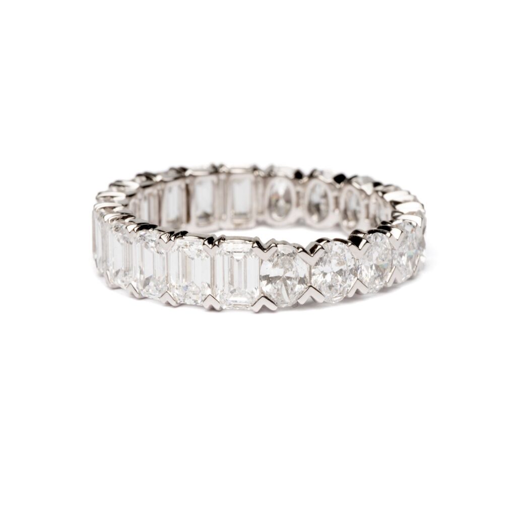 Trotters 9ct White Gold 2.43ct Emerald Cut And 1.47ct Oval Cut Lab Grown Diamond Eternity Ring