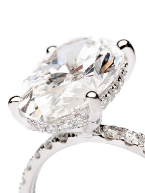 Trotters Platinum 5ct Oval Cut Lab Grown Diamond Ring With Diamond Set Shoulders And Hidden Diamond Halo