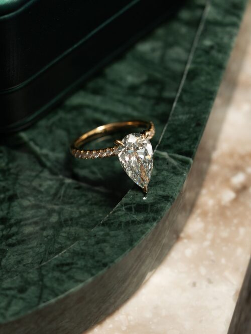 Trotters 18ct Yellow Gold 3ct Pear Cut Lab Grown Diamond Ring With Diamond Set Shoulders And Diamond Set Claws